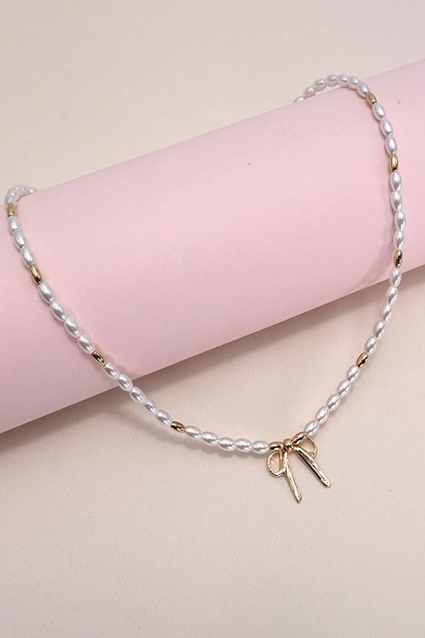 Golden Bow Pearl Charm Necklace