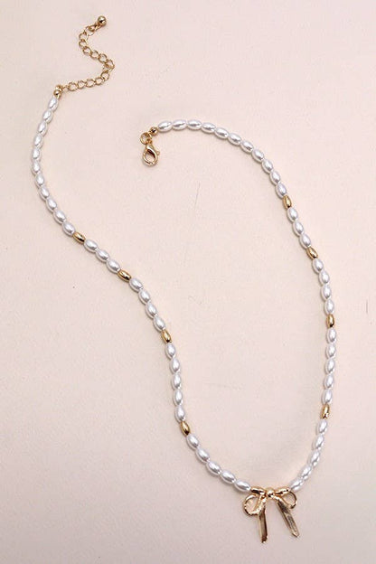 Golden Bow Pearl Charm Necklace