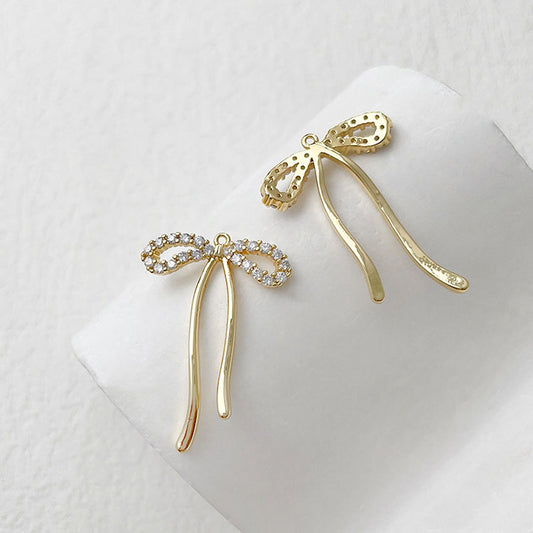 SIGNS, SHAPES & SYMBOLS- Gold Dainty Bow Charm